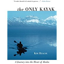 A book cover with two people in kayaks on the water.