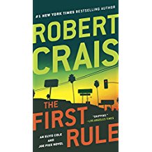 A book cover with the title of the first rule.