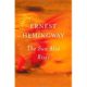 A book cover with an orange background and the title of ernest hemingway.