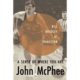 A book cover with an image of a man playing basketball.