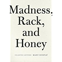 A book cover with the title of madness, rack and honey.