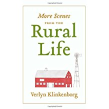 A book cover with a red barn and white text.