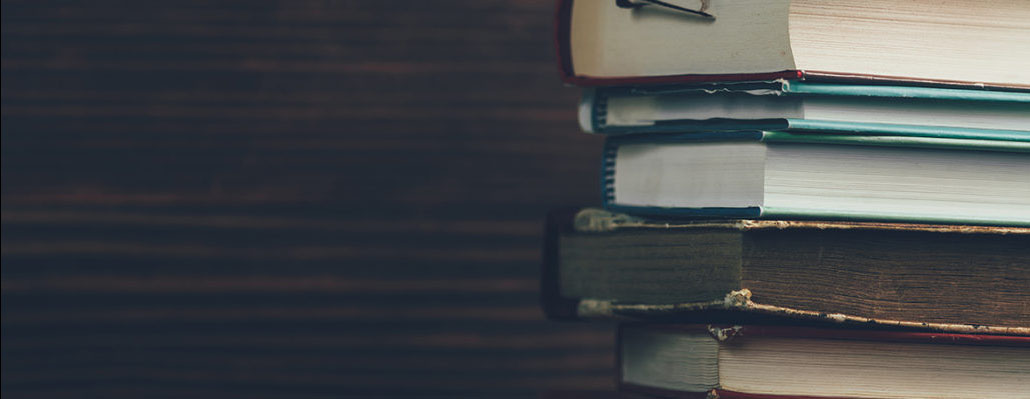 A stack of books on top of each other.