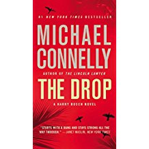 A book cover with the title of michael connelly 's novel.