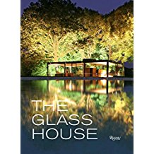 A book cover with the title of the glass house.