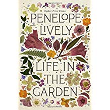 A book cover with flowers and the title of it.