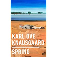 A book cover with a picture of a body laying on the beach.