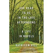 A book cover with trees and a path in the background.