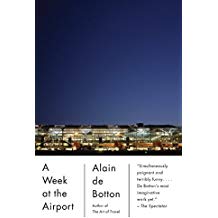 A night view of the airport with text