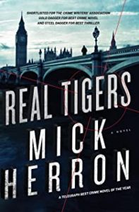 A book cover with the title of real tigers.