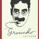 A drawing of groucho marx with a cigarette in his mouth.