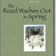 A book cover with the title of the road washes out in spring.