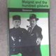 A book cover with two men in suits and hats.