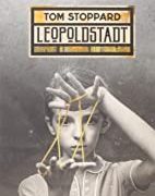 stoppard A young boy holding two strings in front of his face.