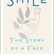 A book cover with the title of smile.