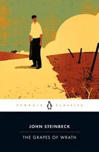 A penguin book cover with a person standing in the grass.