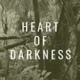 A black and white photo of trees with the words " heart of darkness ".