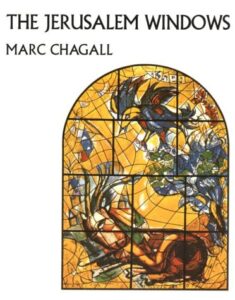 A stained glass window with the words marc chagall on it.