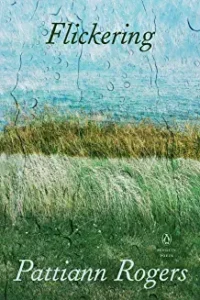 A painting of grass and water in the background.