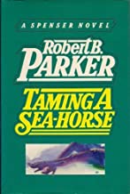 A book cover with the title of " taming a sea horse ".