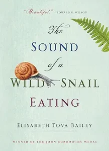 A book cover with an image of a snail eating.