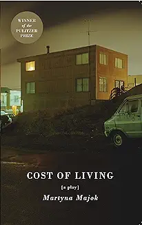 A van parked in front of a building with the words " cost of living ".